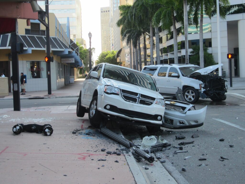 SUV and minivan involved in a traffic accident at a light in Miami, Florida.