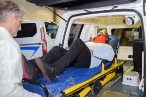 person on a stretcher after a personal injury in hopes to recover compensation and recover damages.