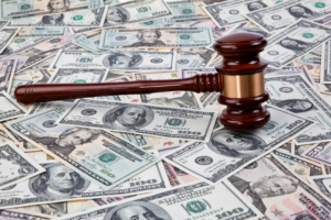 money and a judge's gavel after receiving compensation from an experienced personal injury attorney