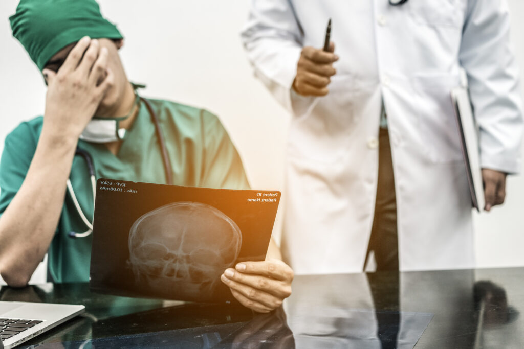 a doctor holding an x-ray